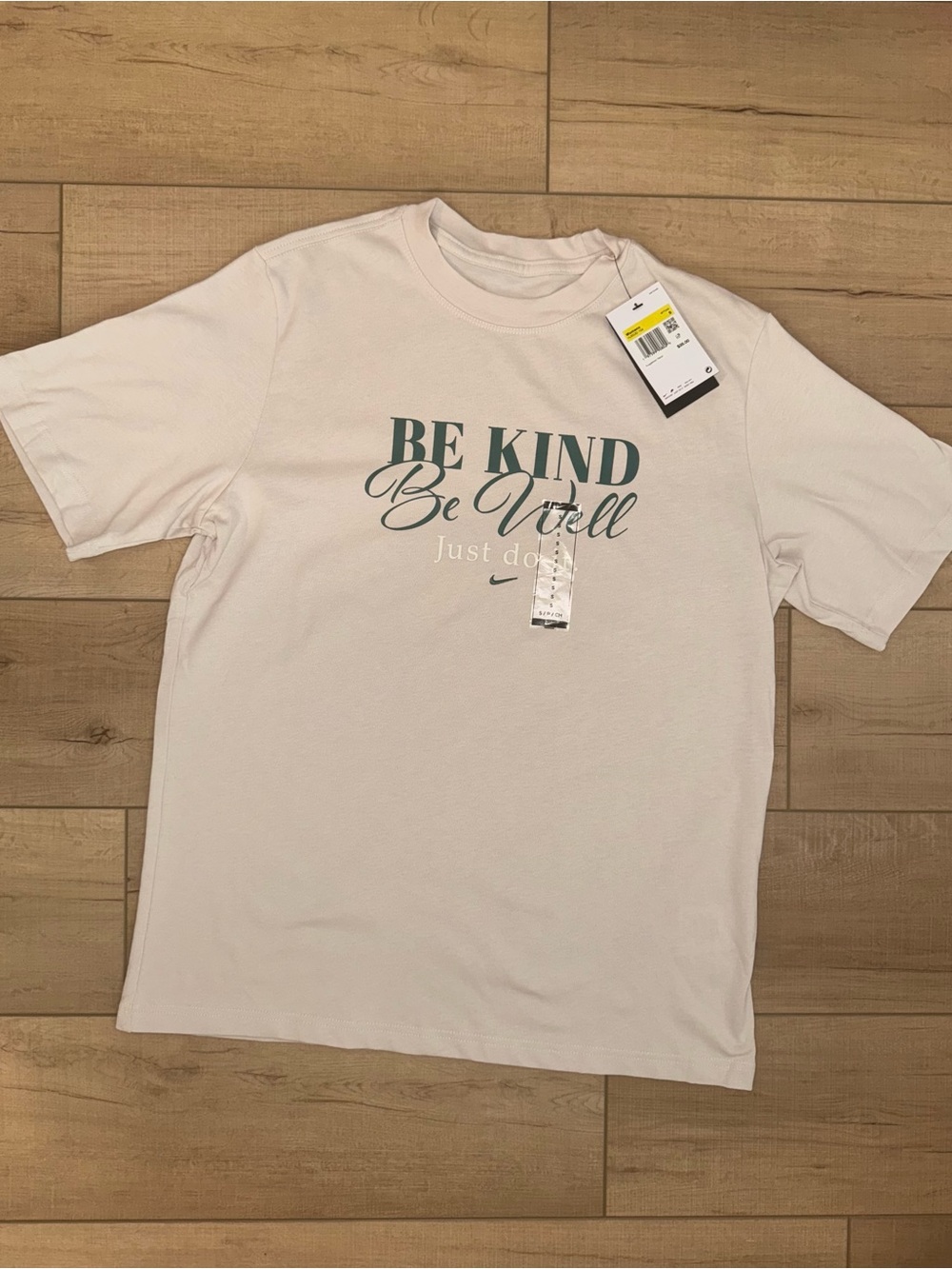 Nike women’s 'Be Kind Be Well' Graphic T-Shirt